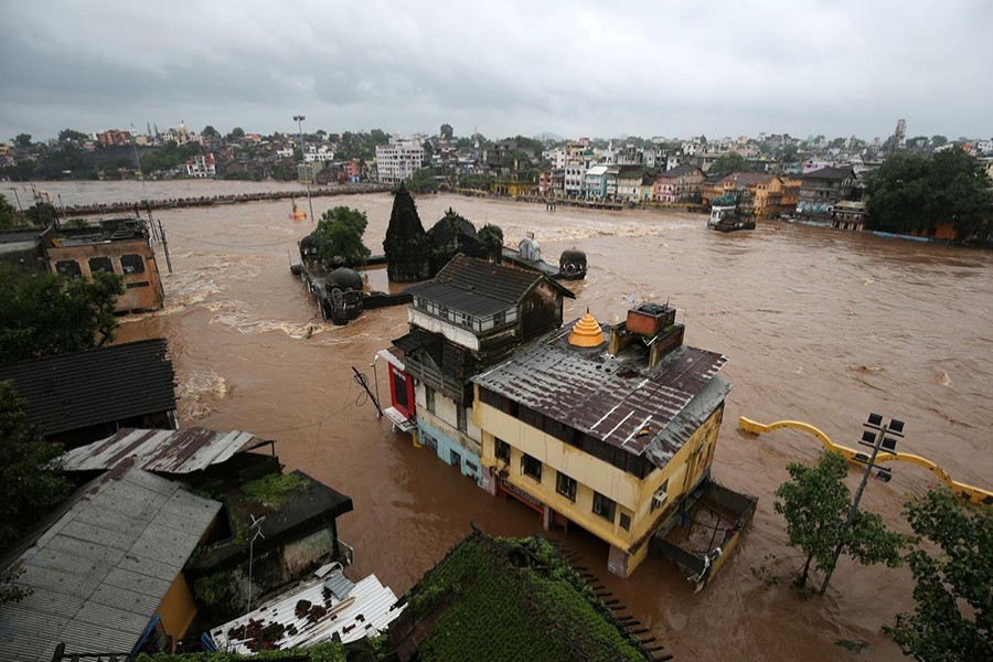 Houses are seen submerged in the waters of overflowing river Godavari after heavy rainfall in Nashik, India on August 5, 2019 — Reuters photo