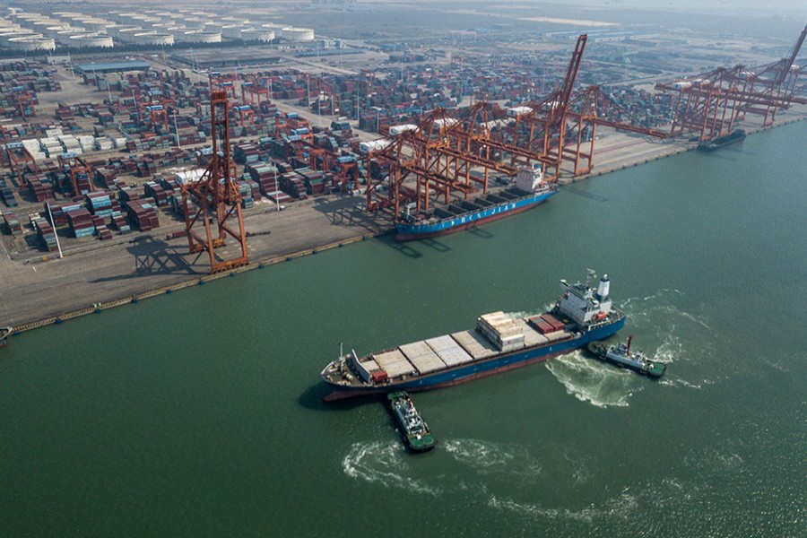 Aerial photo taken on November 3, 2018 shows ships at a dock in Qinzhou Free Trade Port Area, south China's Guangxi Zhuang Autonomous Region — Xinhua/Files