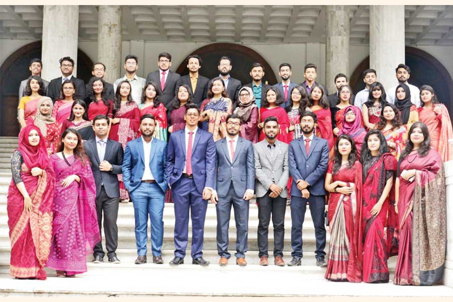 Members of Voice of Business with their President  Md Azmain Adil and Chief Editor Md Mishkat D Kabir in front of Senate Building, University of Dhaka