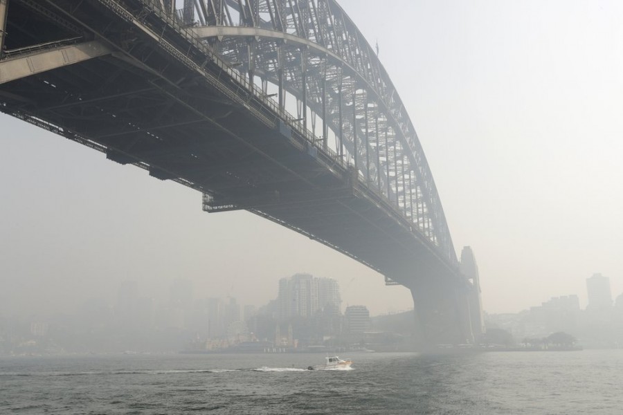 Smoke haze hangs over the Sydney Harbour Bridge in Sydney, on Thursday, Nov 21 - AP Photo/Rick Rycroft