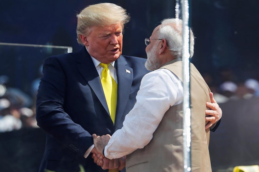 US President Donald Trump embraces with Indian Prime Minister Narendra Modi during the "Namaste Trump" event at Sardar Patel Gujarat Stadium, in Ahmedabad, India on February 24, 2020.          —Photo: Reuters   