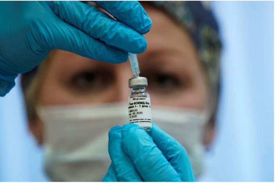 A nurse prepares Russia's "Sputnik-V" vaccine against the coronavirus disease (COVID-19) for inoculation in a post-registration trials stage at a clinic in Moscow, Russia Sept 17, 2020. REUTERS