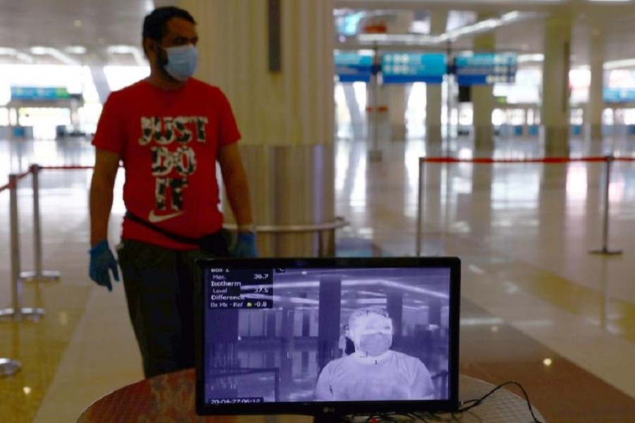 A man is seen through a thermal camera at Dubai International Airport amid the outbreak of the coronavirus disease (Covid-19) in Dubai, UAE, April 27, 2020 — Reuters/Files