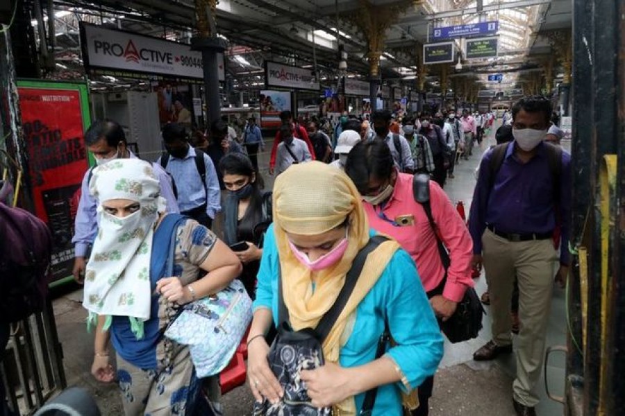 People wearing protective face masks leave the Chhatrapati Shivaji Terminus railway station, amidst the coronavirus disease (Covid-19) outbreak, in Mumbai, India on September 22, 2020 — Reuters/Files