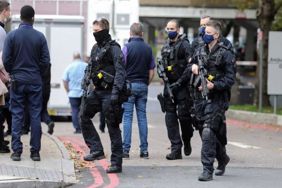 Police officers are seen at St Thomas' Hospital, in London, Britain October 13, 2020. Reuters