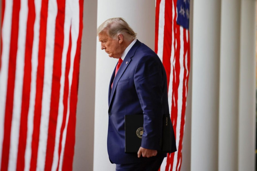 US President Donald Trump walks down the West Wing colonnade from the Oval Office to the Rose Garden to deliver an update on the so-called "Operation Warp Speed" programme at the White House in Washington, US on November 13, 2020 — Reuters photo