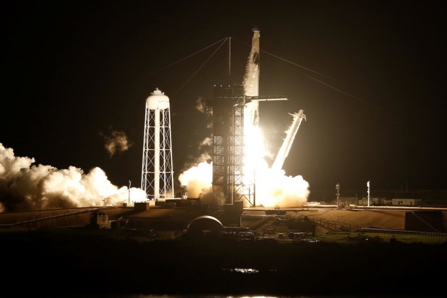 A SpaceX Falcon 9 rocket, topped with the Crew Dragon capsule, is launched carrying four astronauts on the first operational NASA commercial crew mission at Kennedy Space Center in Cape Canaveral, Florida, US, November 15, 2020. REUTERS/Joe Skipper
