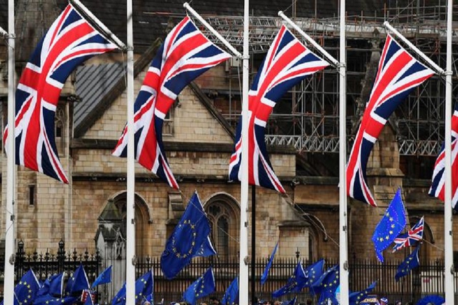 British Union Jack and EU flags are seen during a protest outside the Houses of Parliament in London, Britain, January 30, 2020 — Reuters/Files