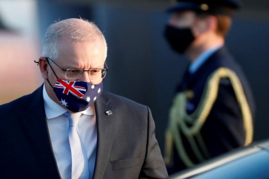 Australian Prime Minister Scott Morrison arrives at Haneda airport in Tokyo, Japan, November 17, 2020. REUTERS/Issei Kato