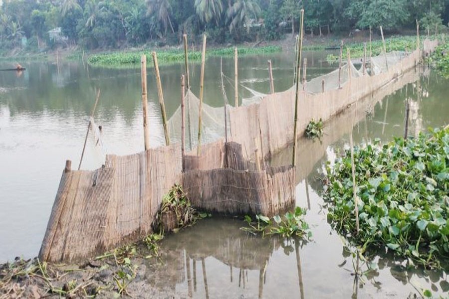 An enclosure set illegally for fishing in the Chitra River in Jashore’s Bagharpara — FE Photo