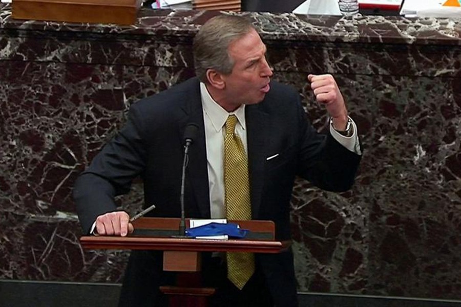 Michael van der Veen, attorney for former US President Donald Trump, answers a question submitted by a Senator during the fourth day of the impeachment trial of the former president on charges of inciting the deadly attack on the US Capitol, on Capitol Hill in Washington, US on February 12, 2021 — US Senate TV/Handout via Reuters