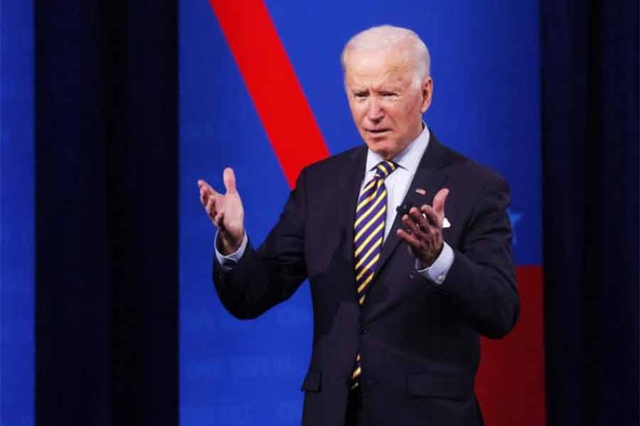 China will pay a price for its human rights abuses, Biden warns