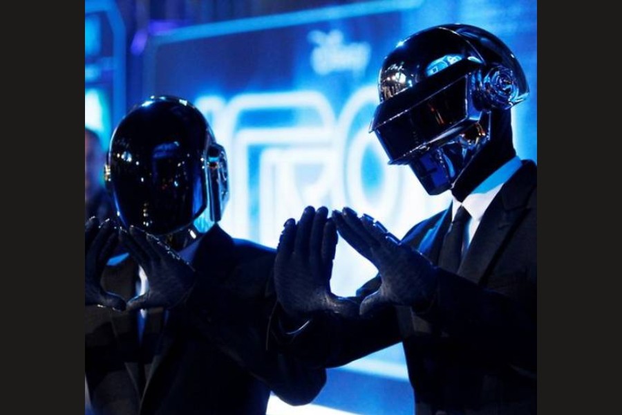 FILE PHOTO: Musicians Thomas Banglater and Guy-Manuel de Homem-Christo of Daft Punk pose at the world premiere of the film "TRON: Legacy" in Hollywood, California, December 11, 2010. REUTERS/Danny Moloshok/File Photo