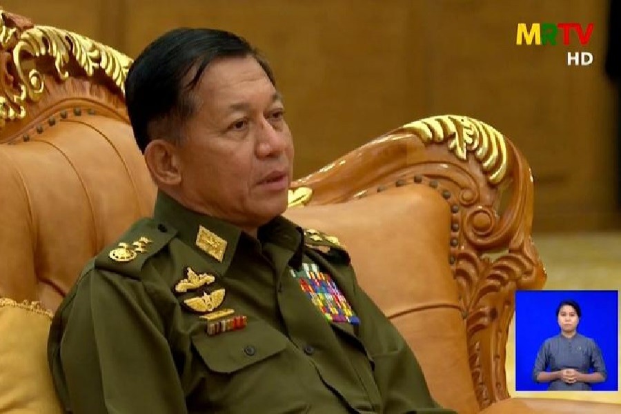 A screen grab from Myanmar state television broadcast from February 3, 2021 shows General Min Aung Hlaing speaking during a meeting — MRTV/Handout via Reuters