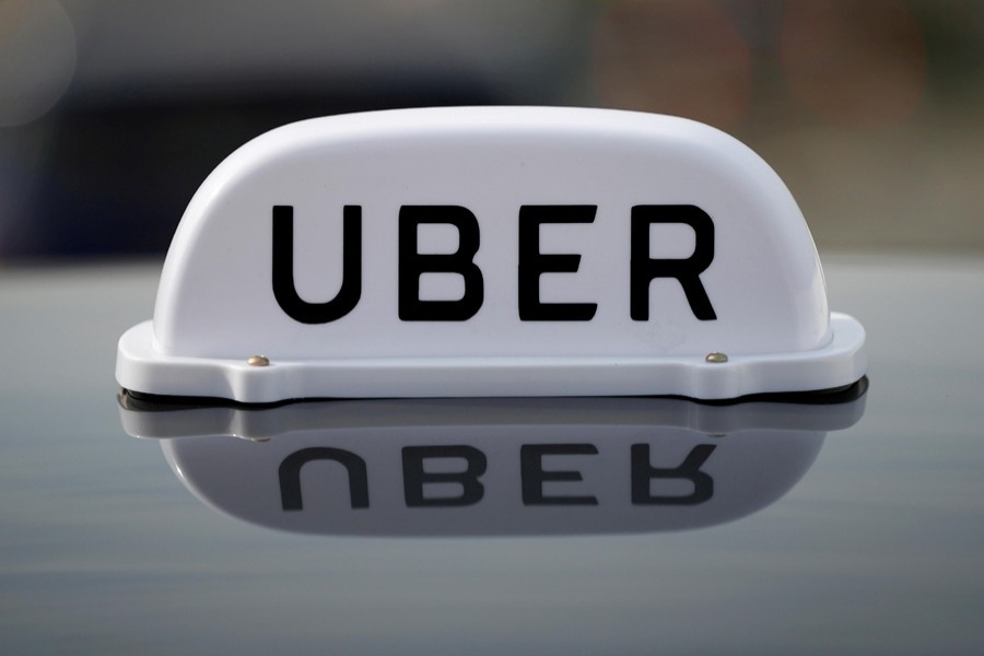Uber under pressure on UK minimum wage in test of gig economy