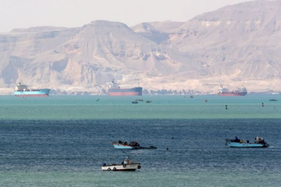 Ships and boats are seen at the entrance of Suez Canal, which was blocked by stranded container ship Ever Given that ran aground, Egypt on March 28, 2021 — Reuters photo