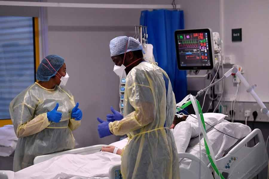 Nurses treating a COVID-19 patient in the ICU (Intensive Care Unit) at Milton Keynes University Hospital in Britain in January this year amid the spread of the coronavirus disease (COVID-19) pandemic -Reuters file photo