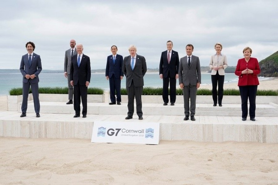 Canadian Prime Minister Justin Trudeau, European Council President Charles Michel, US President Joe Biden, Japan's Prime Minister Yoshihide Suga, British Prime Minister Boris Johnson, Italy's Prime Minister Mario Draghi, French President Emmanuel Macron, European Commission President Ursula von der Leyen and German Chancellor Angela Merkel pose for a group photo at the G7 summit, in Carbis Bay, Britain, June 11, 2021 — Reuters