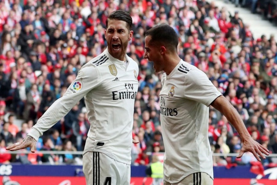 February 9, 2019 Real Madrid's Sergio Ramos celebrates scoring their second goal with Lucas Vazquez Reuters/Susana Vera