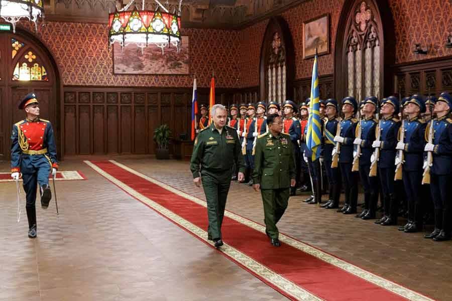 Russia's Defence Minister Sergei Shoigu and Myanmar's Commander in-Chief Senior General Min Aung Hlaing walking past the honour guard prior to their talks in Moscow on Tuesday -Reuters photo