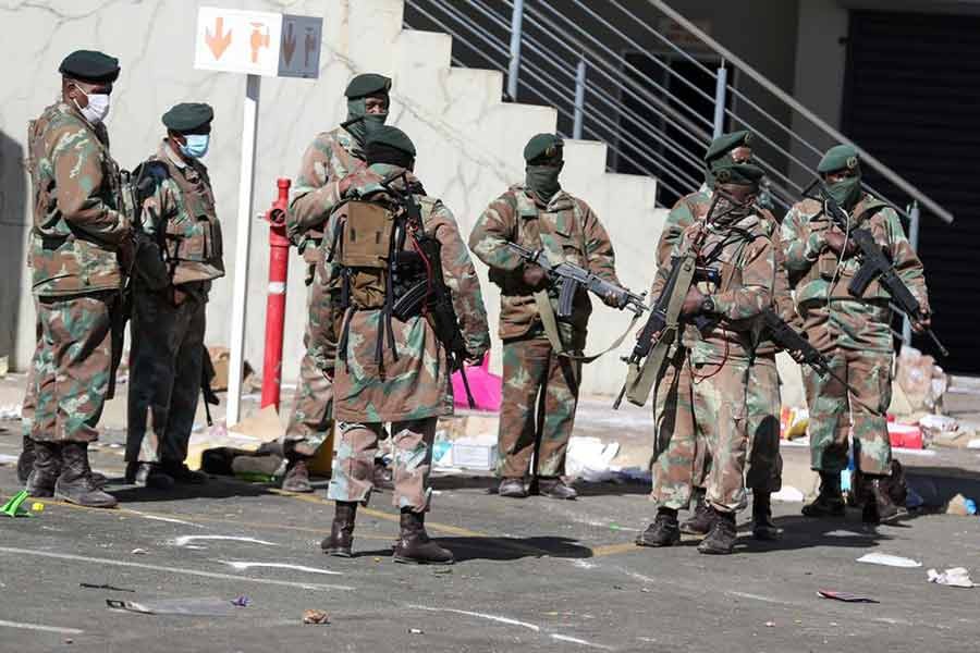 Members of the military keeping guard at a mall in South Africa on Tuesday as the country deploys army to quell unrest linked to jailing of former President Jacob Zuma -Reuters photo