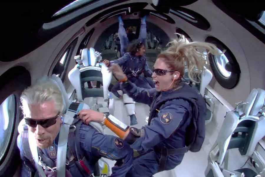 Billionaire Richard Branson makes a statement as crew members Beth Moses and Sirisha Bandla float in zero gravity on board Virgin Galactic's passenger rocket plane VSS Unity after reaching the edge of space above Spaceport America in US on July 11.           —Reuters