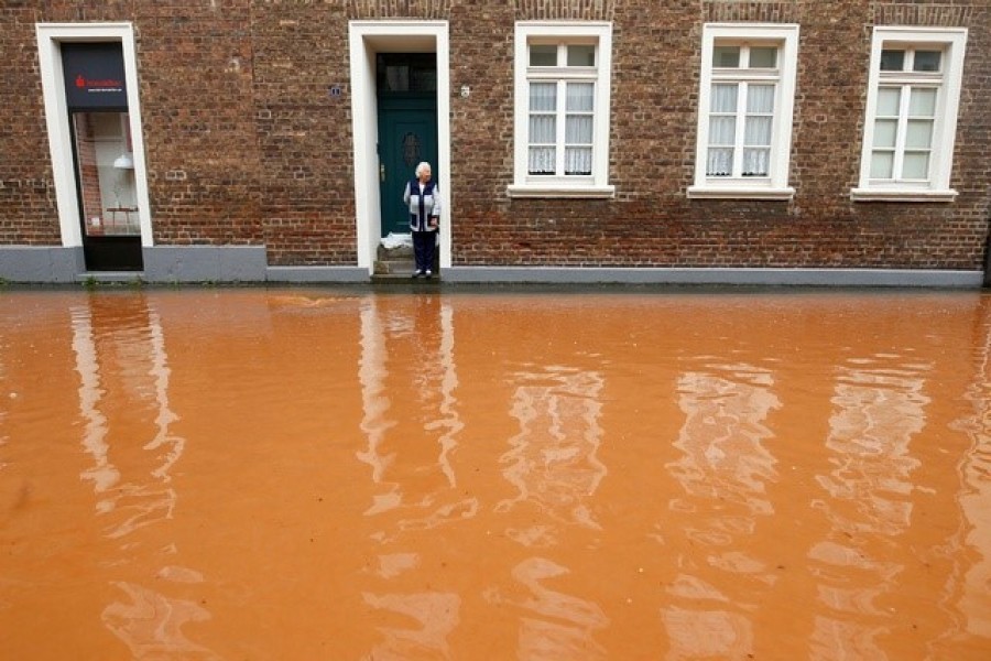 A street is flooded following heavy rainfalls in Erftstadt, Germany, July 16, 2021 — Reuters