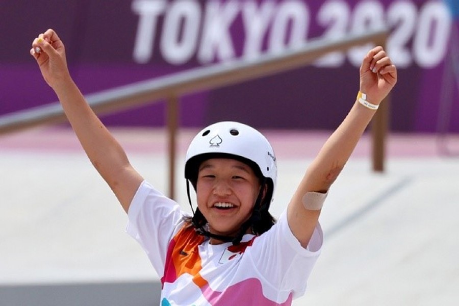 Gold medalist woman skater Momiji Nishiya of Japan celebrates on Jul 26, 2021 — Reuters