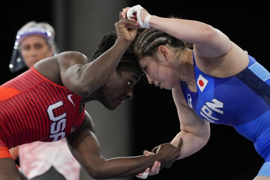 In this Aug 2, 2021, file photo, United States' Tamyra Marianna Stock Mensah, left, and Japan's Sara Co compete during the women's 68kg freestyle wrestling match at the 2020 Summer Olympics in Chiba, Japan – AP Photo