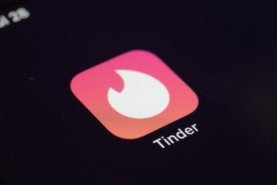 This Tuesday, July 28, 2020, file photo shows the icon for the Tinder dating app on a device in New York. The use of dating apps in the last 18 months of the pandemic has surged around the globe. Tinder reported 2020 as its busiest year — AP Photo