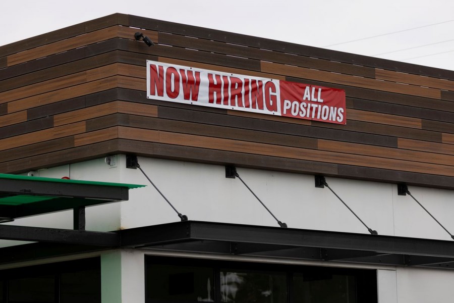A restaurant advertising jobs looks to attract workers in Oceanside, California, US on May 10, 2021 — Reuters/Files