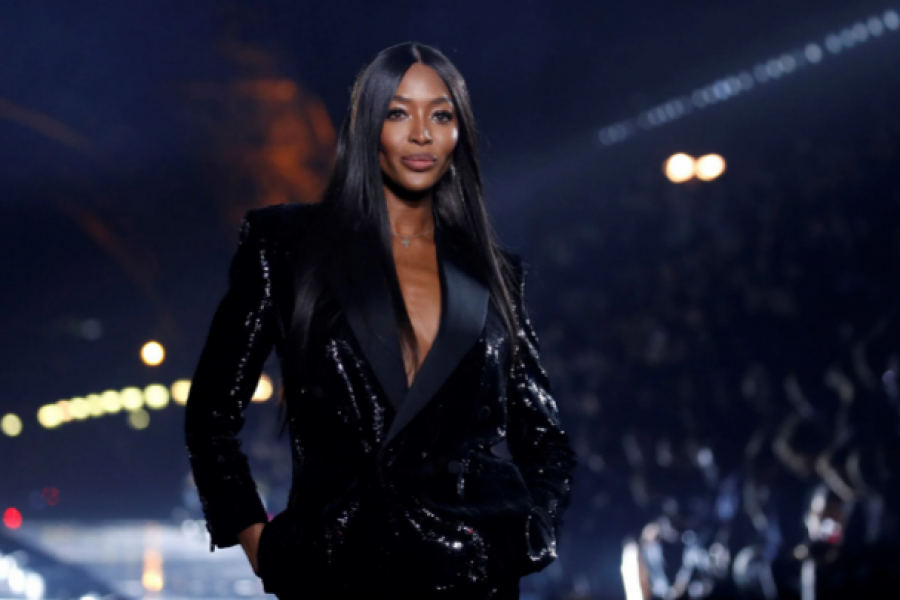 Naomi Campbell presents a creation by designer Anthony Vaccarello as part of his Spring/Summer 2020 women's ready-to-wear collection show for fashion house Saint Laurent during Paris Fashion Week in Paris, France, September 24, 2019. REUTERS/Gonzalo Fuentes/File Photo