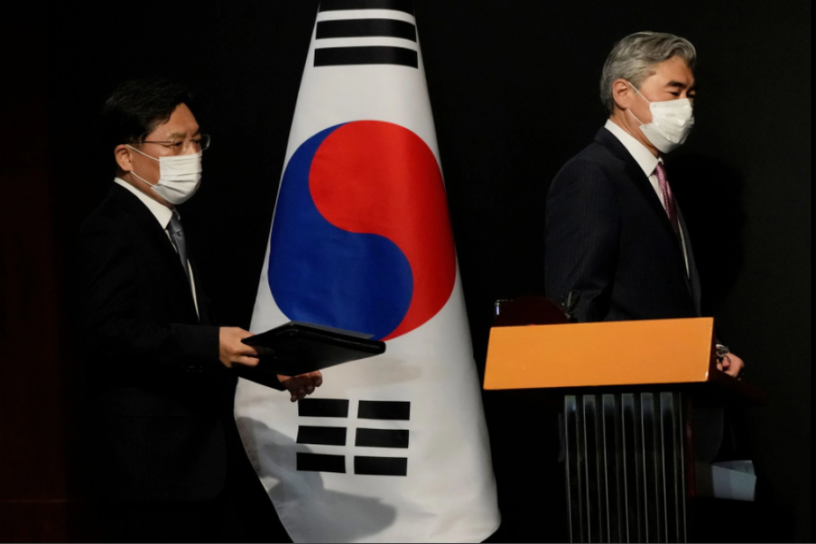 US Special Representative for North Korea, Sung Kim and Noh Kyu-duk, South Korea's Special Representative for Korean Peninsula Peace and Security Affairs, arrive to attend a briefing after their meeting at a hotel in Seoul, South Korea October 24, 2021. Ahn Young-joon/Pool via REUTERS