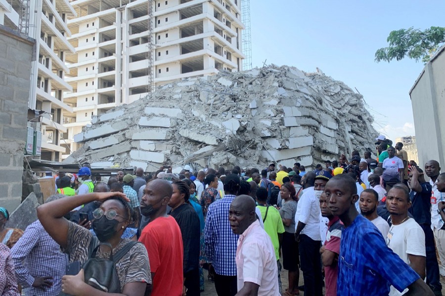 People gather at the site of a collapsed 21-story building in Ikoyi, Lagos, Nigeria on November 1, 2021— Reuters photo