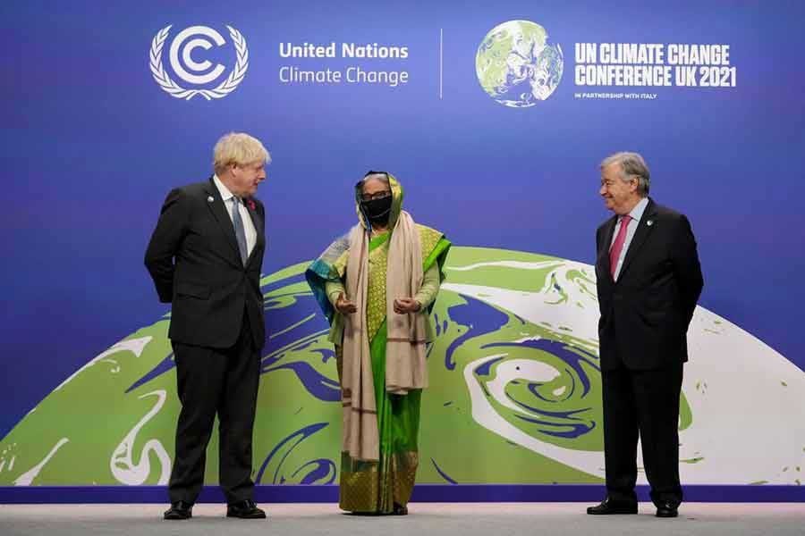 Britain's Prime Minister Boris Johnson and United Nations Secretary-General Antonio Guterres greeting Prime Minister Sheikh Hasina during arrivals at the UN Climate Change Conference (COP26) in Glasgow of Scotland on November 1 –Reuters file photo