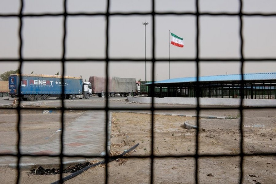 Iran's flag is pictured at the Milak border crossing between Iran and Afghanistan, Sistan and Baluchestan Province, Iran September 8, 2021. Majid Asgaripour/WANA (West Asia News Agency) via REUTERS