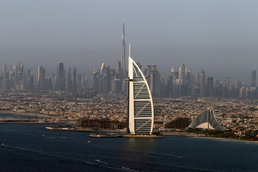 A view of the Burj Al Arab hotel and Burj Khalifa in Dubai, United Arab Emirates, June 9, 2021. REUTERS
