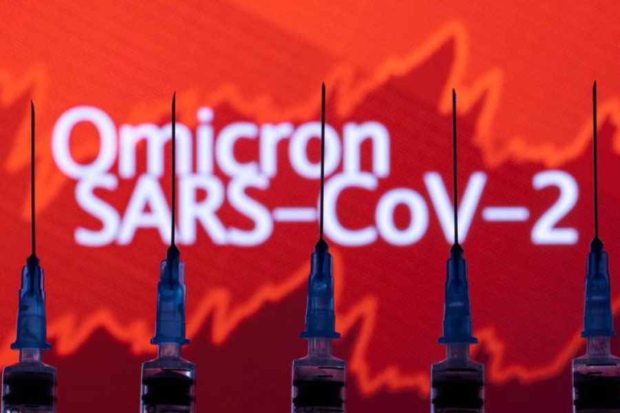 - Syringes with needles are seen in front of a displayed stock graph and words "Omicron SARS-CoV-2" in this illustration taken, November 27, 2021. REUTERS/Dado Ruvic/Illustration/file photo