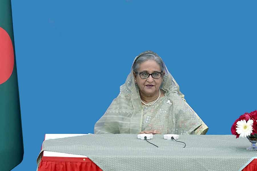 Prime Minister Sheikh Hasina delivering a video message at a programme in New Delhi on Monday on the Friendship Day marking 50 years of Bangladesh-India diplomatic relations -PID Photo