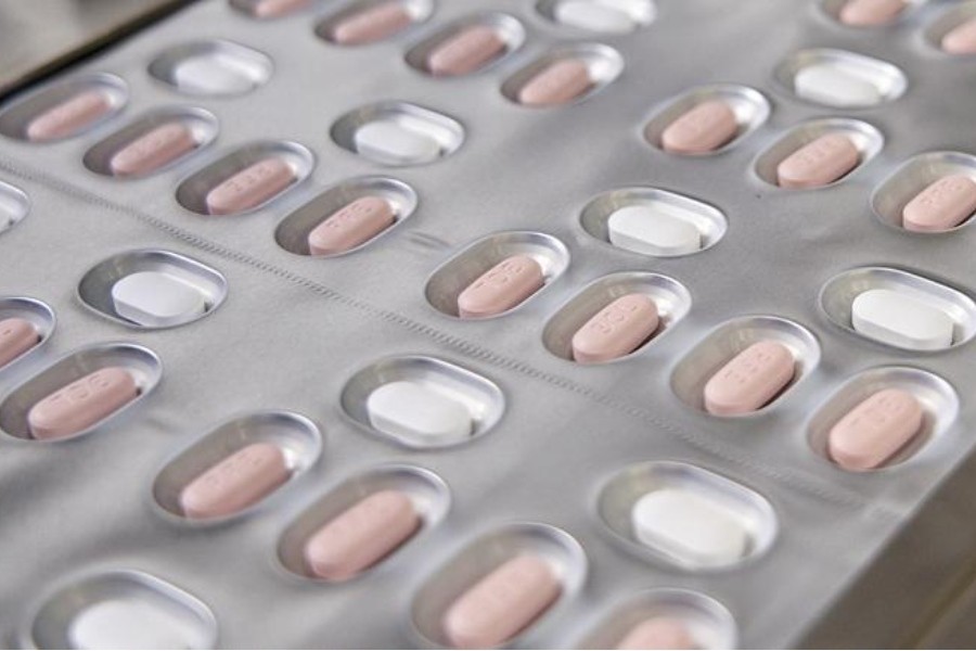 - A photo provided by Pfizer, shows Paxlovid, Pfizer’s COVID treatment pill, being produced in a laboratory in Freiburg, Germany