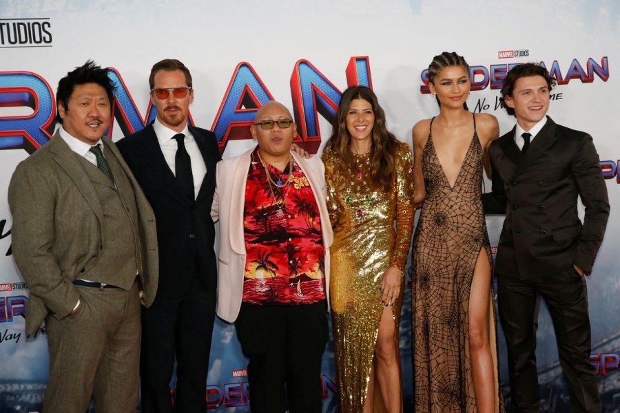 Cast members Benedict Wong, Benedict Cumberbatch, Jacob Batalon, Marisa Tomei, Zendaya and Tom Holland pose for a photograph as they attend the premiere for the film Spider-Man: No Way Home in Los Angeles, California, December 13, 2021 — REUTERS/Mario Anzuoni