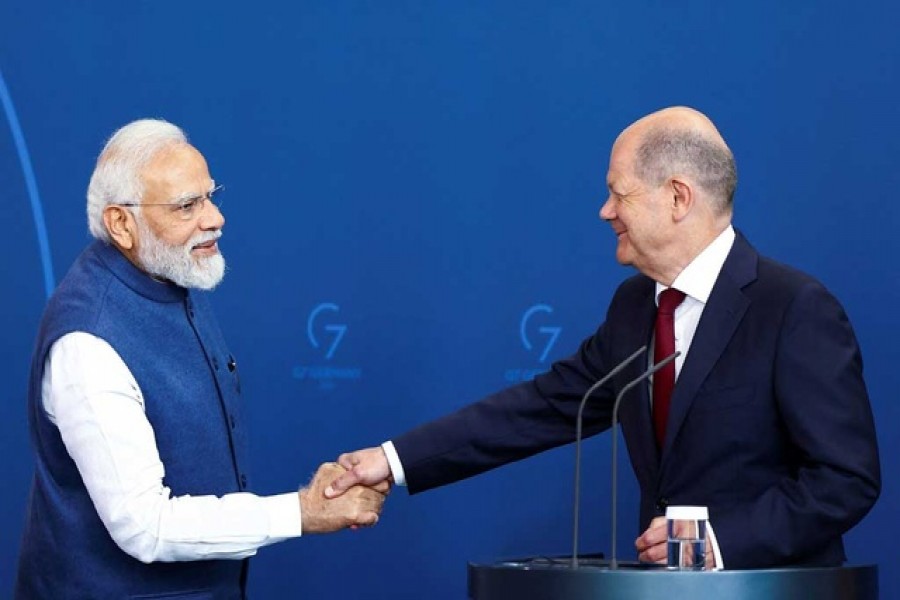 German Chancellor Olaf Scholz and Indian Prime Minister Narendra Modi shake hands as they attend a news conference during the German-Indian government consultations at the Chancellery in Berlin, Germany May 2, 2022 – Reuters/Lisi Niesner