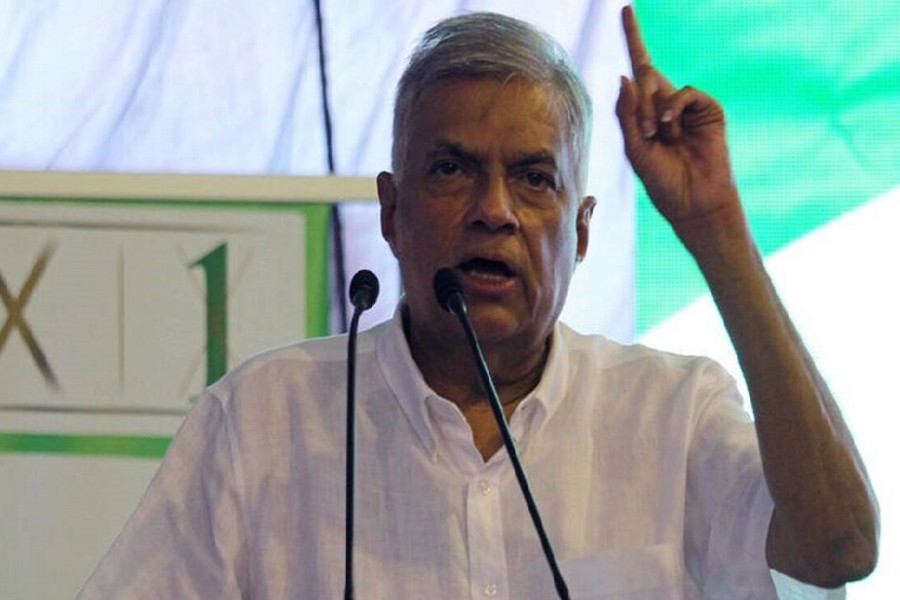 Wickremesinghe takes oath, returns as Sri Lanka's PM
