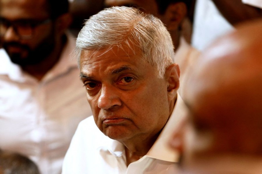 Ranil Wickremesinghe, newly appointed prime minister, arrives at a Buddhist temple after his swearing-in ceremony amid the country's economic crisis, in Colombo, Sri Lanka, May 12, 2022. REUTERS/Dinuka Liyanawatte/File Photo
