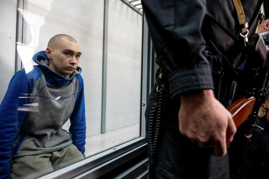 Russian soldier Vadim Shishimarin, 21, suspected of violations of the laws and norms of war, sitting inside a defendants' cage during a court hearing in Kyiv of Ukraine on May 13 this year –Reuters file photo