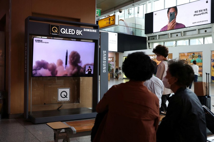 People watch a TV broadcasting a news report on North Korea's launch of three missiles what appeared to have involved an intercontinental ballistic missile (ICBM), in Seoul, South Korea on May 25, 2022 — Reuters photo