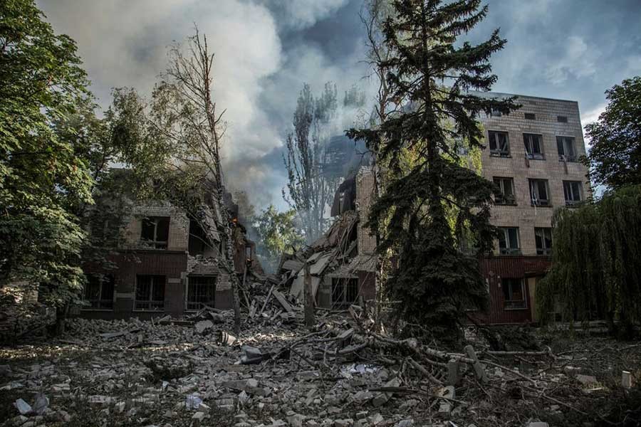 A smoke rising over remains of a building destroyed by a military strike in Luhansk region of Ukraine on June 17 this year –Reuters file photo