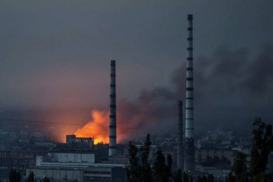 Smoke and flame rise after a military strike on a compound of Sievierodonetsk's Azot Chemical Plant, as Russia's attack on Ukraine continues, in Lysychansk, Luhansk region, Ukraine June 18, 2022. REUTERS/Oleksandr Ratushniak