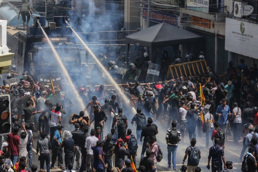 Security forces fired water cannon and tear gas in an effort to disperse the crowd - EPA