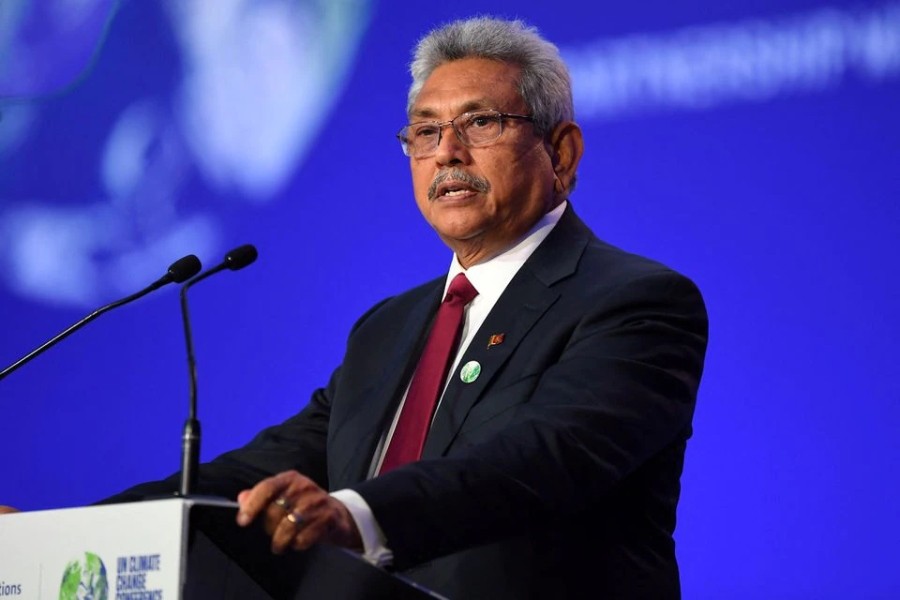 More than eight months before an economic crisis and mass protests prompted him to flee Sri Lanka, President Gotabaya Rajapaksa presented his national statement during the World Leaders' Summit at the UN Climate Change Conference (COP26) in Glasgow, Scotland, Britain November 1, 2021. Andy Buchanan/Pool via REUTERS/File Photo